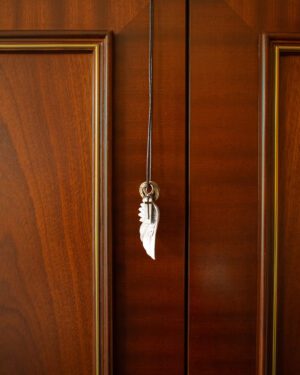 ABERCROMBE & FITCH SILVER WING NECKLACE IN BLACK CORD
